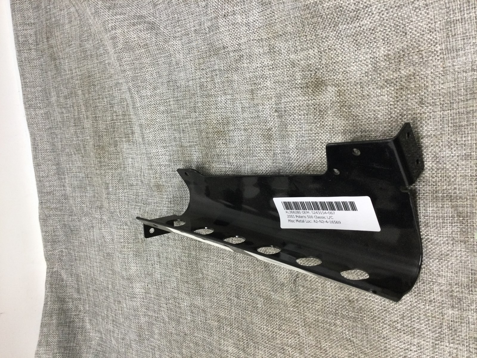 2001 Polaris UPPER FOOTREST TOE CLIP BLACK RH