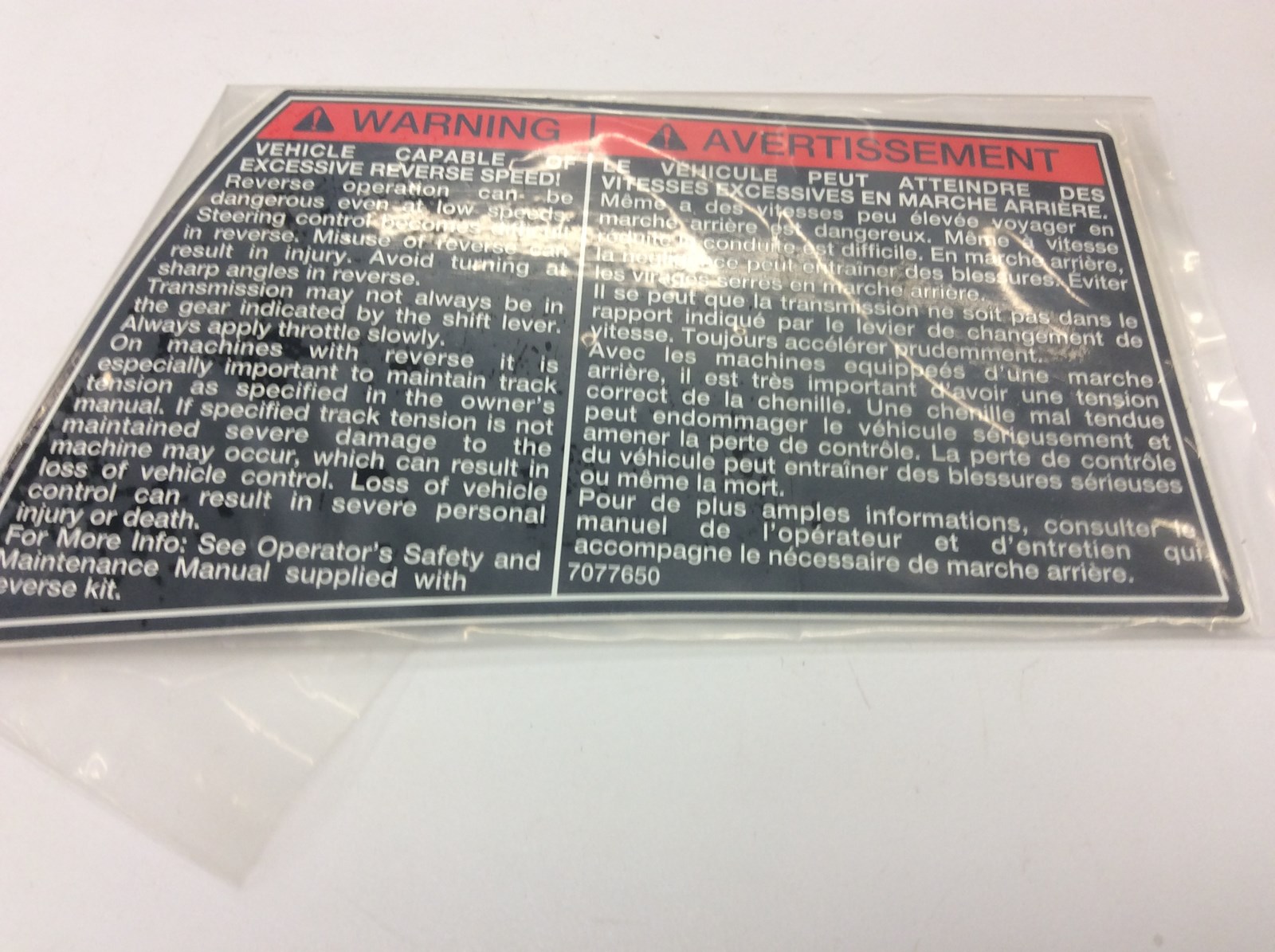 DECAL - LH REVERSE WARNING