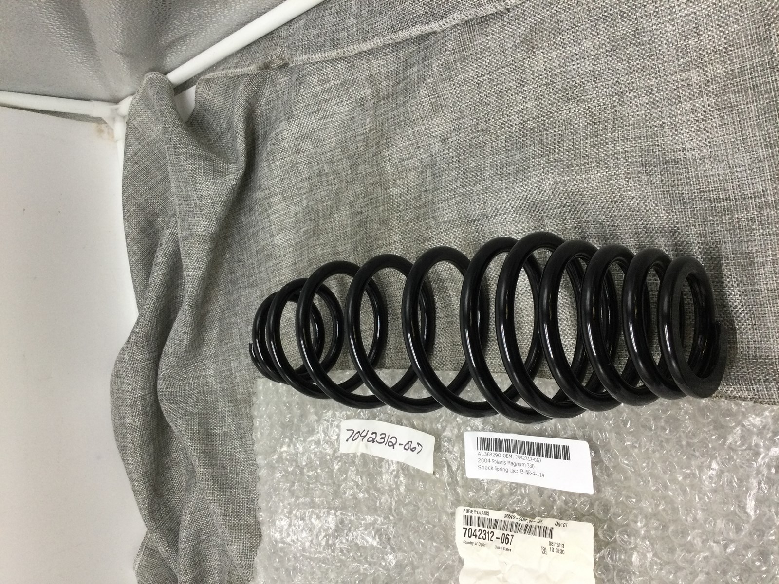 2004 Polaris FRONT STRUT SPRING