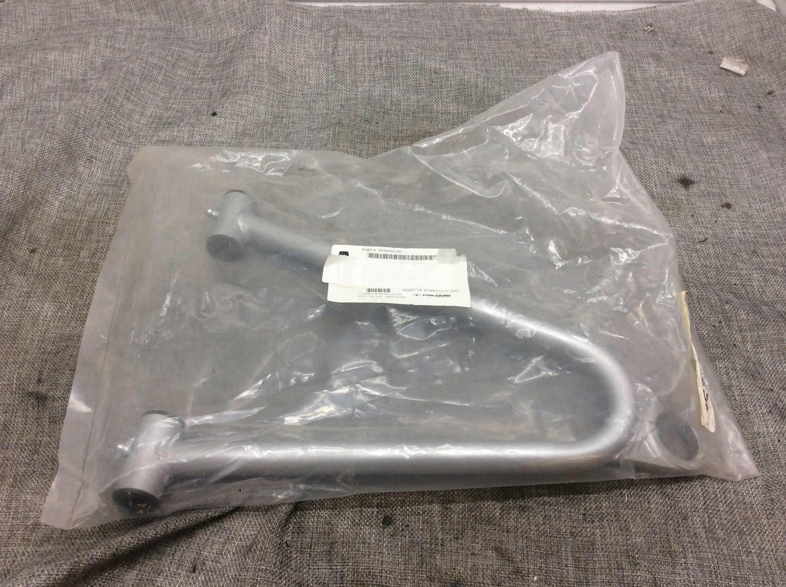 2005 Polaris RH upper A-arm