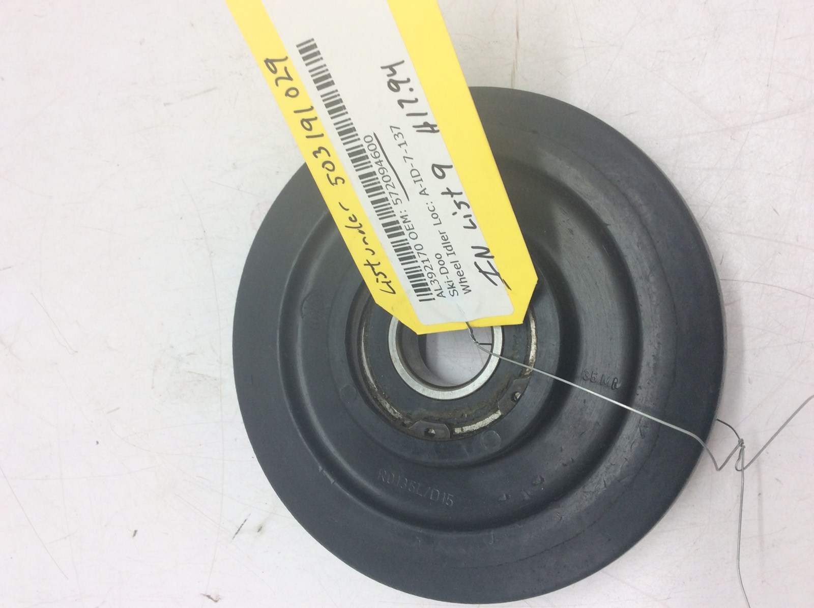 Used Black Idler Wheel - Replaced by # 503191029 - SEE COMMENTS