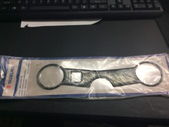 2001 Suzuki Bracket cover, triple tree, coated carbon