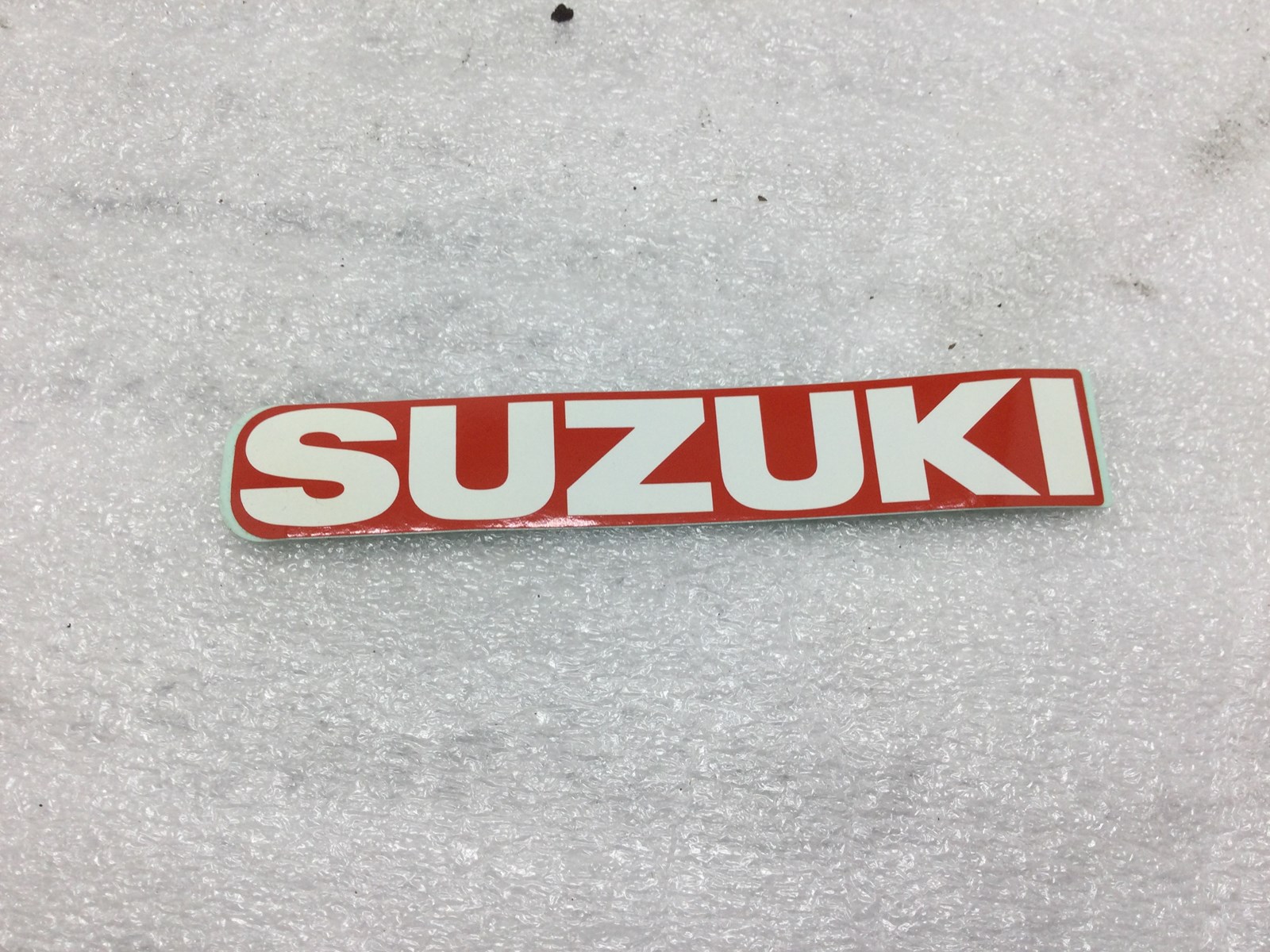 1990 Suzuki Decal - white letters red background